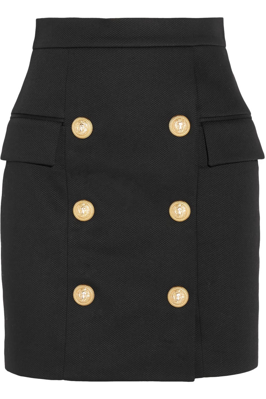 Una falda negra tipo lápiz es esa prenda que a todo cuerpo, silueta y altura le viene bien. Lo más importante es que tenga una buena pretina, que se ajuste a la cintura, y que el largo sea a media rodilla. (Balmain)