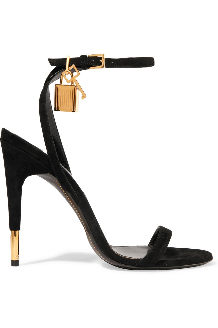 Las sandalias negras de trabilla son el zapato emblemático de los vestidos de gala. No hay un vestido que puede resistirse a su poder, pero incluso si un día quieres hacer que tus jeans negros salgan de su lugar anodino, úsalos con este básico y cobrarán un nuevo aire. (Tom Ford)