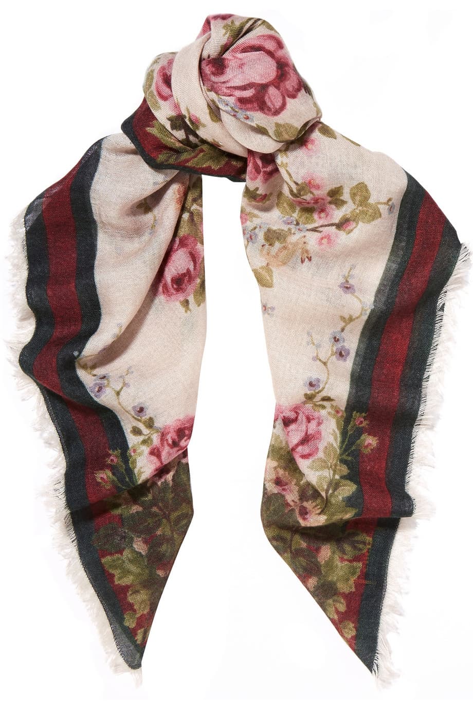 Una bella pañoleta es algo que deberías intentar comprar en una tienda vintage o escarbar en las profundidades del baúl de tu abuela. Con ella puedes desde hacerte un moño para tu cabeza hasta inventar un cinturón. ( Gucci)