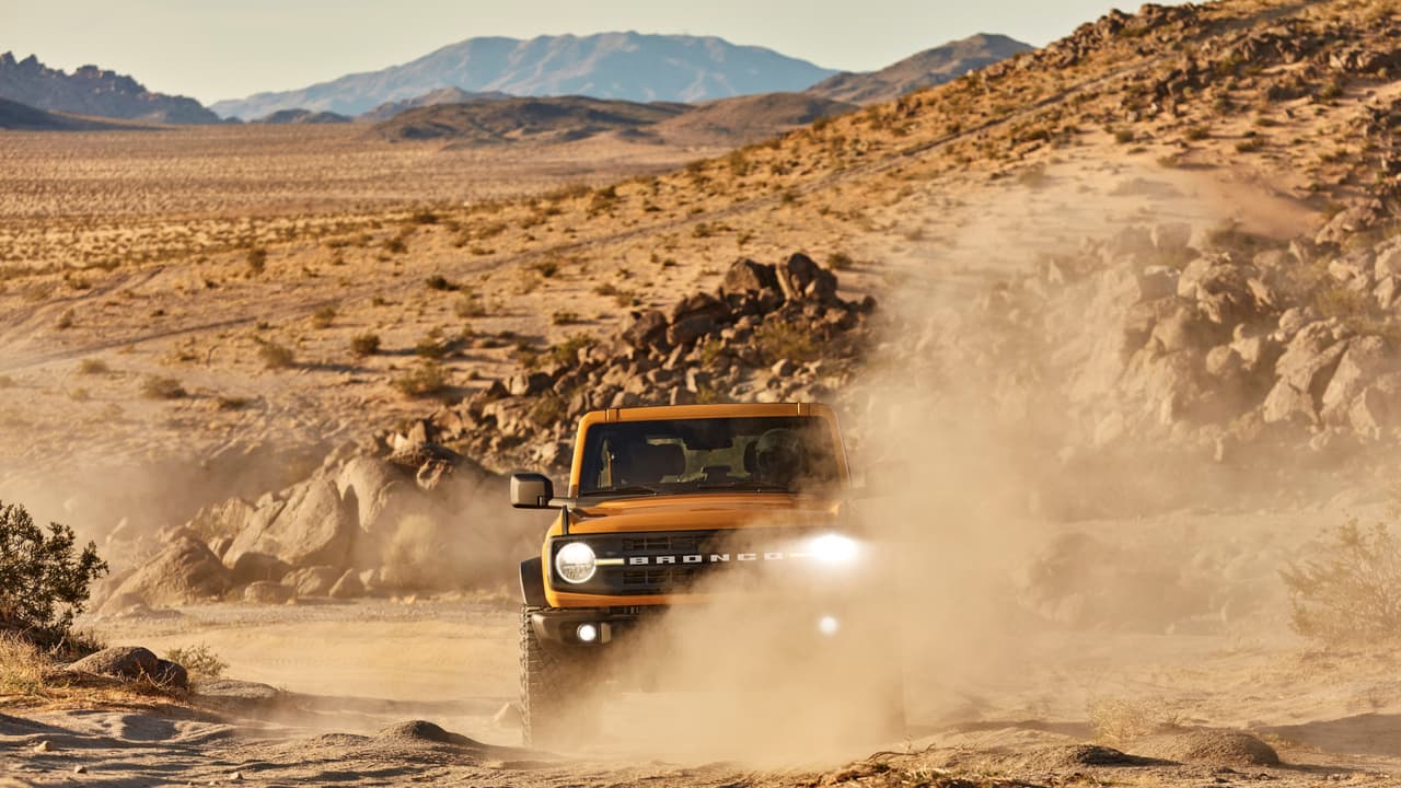 Pre-production 2021 two-door Bronco Black Diamond series in Cyber Orange Metallic Tri-Coat with available Sasquatch™ off-road package.