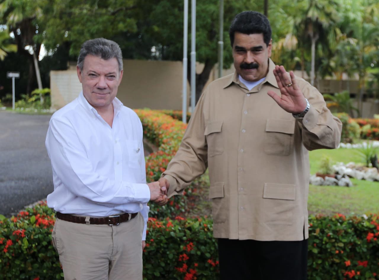 Juan Manuel Santos y Nicolás Maduro, presidentes de Colombia y Venezuela, respectivamente.