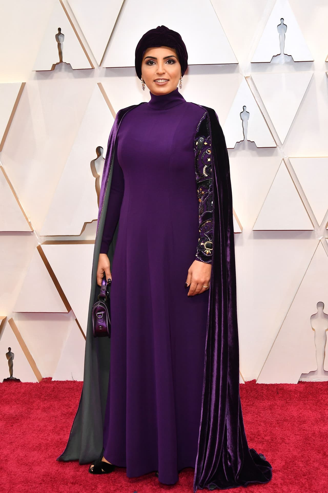 La CEO del Doha Film Institute, Fatma Al Remaihi, llegó usando este vestido morado.