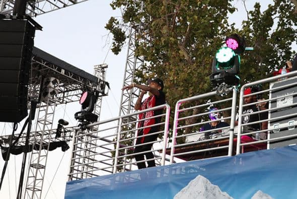 Kid Ink performed high above the crowd from the Coors Light stage! See exclusive pics of his high energy performance!