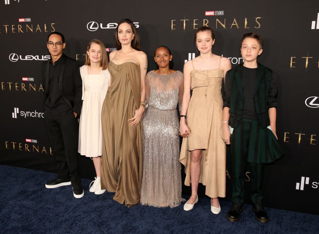 HOLLYWOOD, CALIFORNIA - OCTOBER 18: (L-R) Maddox Jolie-Pitt, Vivienne Jolie-Pitt, Angelina Jolie, Zahara Jolie Pitt, Shiloh Jolie-Pitt, and Knox Jolie Pitt arrive at the Premiere of Marvel Studios' Eternals on October 18, 2021 in Hollywood, California. (Photo by Jesse Grant/Getty Images for Disney)