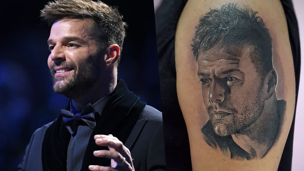 <h3 class="cms-H3-H3">Ricky Martin </h3>
<br>
<br>
<a href="https://www.univision.com/musica/famosos-cantantes-que-se-han-hecho-arreglitos-esteticos-fotos" target="_blank">El artista</a> no solo ha hecho suspirar a muchos de sus seguidores con su atractivo físico, sino también se convirtió en un
<a href="https://www.univision.com/musica/thalia-ricky-martin-y-bad-bunny-celebran-el-mes-del-movimiento-lgtbq" target="_blank">ícono de la comunidad LGBTIQ+</a>. Uno de sus fans, se tatuó la cara del cantante en un brazo.