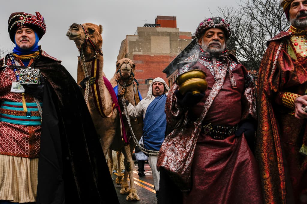 Camels walk through snow during El Museo del Barrio's 47th annual Three Kings Day parade, Monday, Jan. 6, 2025, in New York. (AP Photo/Julia Demaree Nikhinson)