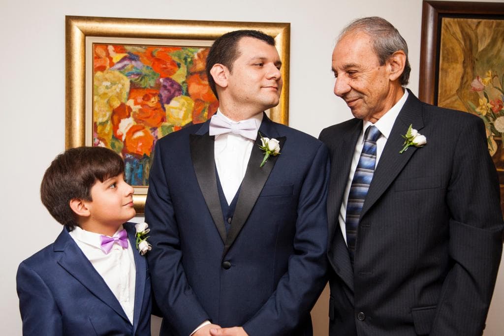 Nuestro reportero Daniel Tuccio con su papá y su hijo.