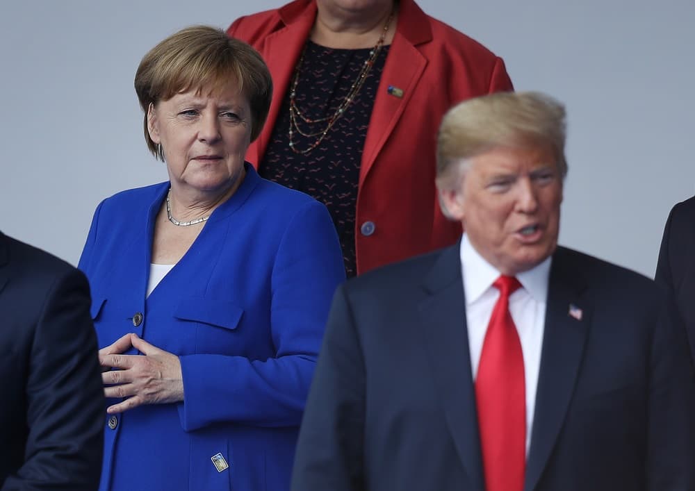 BRUSSELS, BELGIUM - JULY 11: German Chancellor Angela Merkel and U.S. President Donald Trump attend the opening ceremony at the 2018 NATO Summit at NATO headquarters on July 11, 2018 in Brussels, Belgium. Leaders from NATO member and partner states are meeting for a two-day summit, which is being overshadowed by strong demands by U.S. President Trump for most NATO member countries to spend more on defense. (Photo by Sean Gallup/Getty Images)