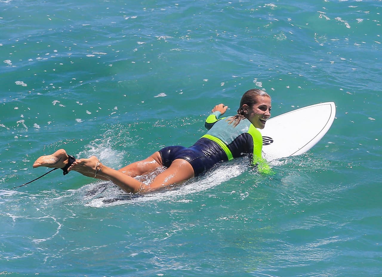 Como una sirenita en el agua.