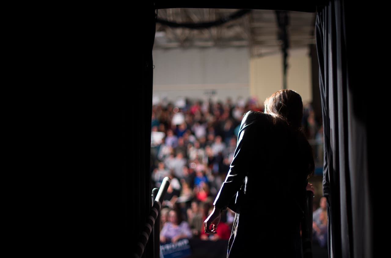 <b>Behind the scenes.</b> Hope Hicks, then communications manager for the Republican presidential campaign, oversees Donald Trump's presentation at a rally in Sumter, South Carolina. February 17, 2016.