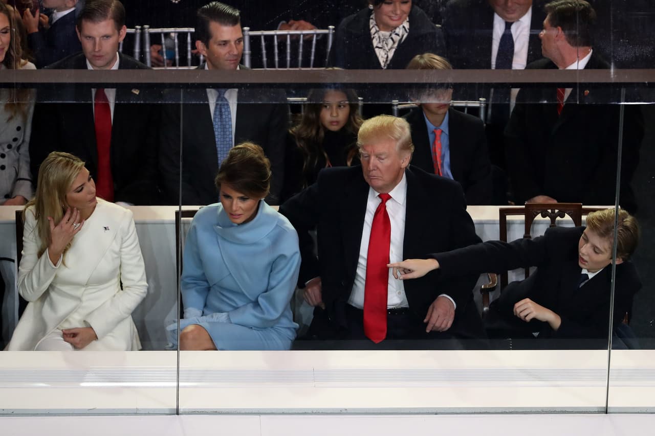 WASHINGTON, DC - JANUARY 20: (L-R) Ivanka Trump, first lady Melania Trump, U.S. President Donald Trump and Barron Trump watch the Inaugural Parade from the main reviewing stand in front of the White House on January 20, 2017 in Washington, DC. Donald J. Trump was sworn in today as the 45th president of the United States. (Photo by Joe Raedle/Getty Images)