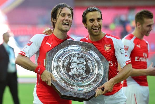 Tomas Rosicky y Mathieu Flamini.
