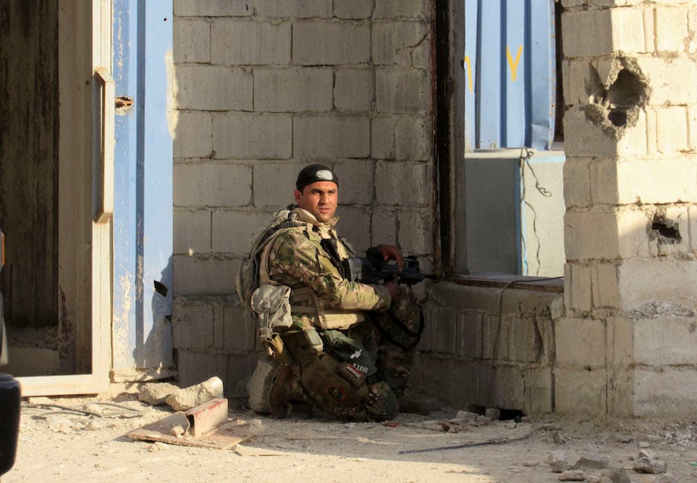 Los soldados iraquíes apoyo de la coalición internacional