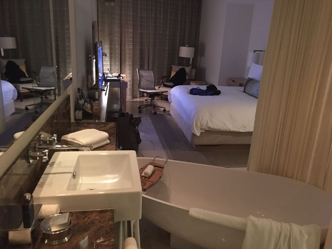 Rooms at Trump's Panama hotel are elegantly furnished and a bath tub is positoned in the middle of the room.