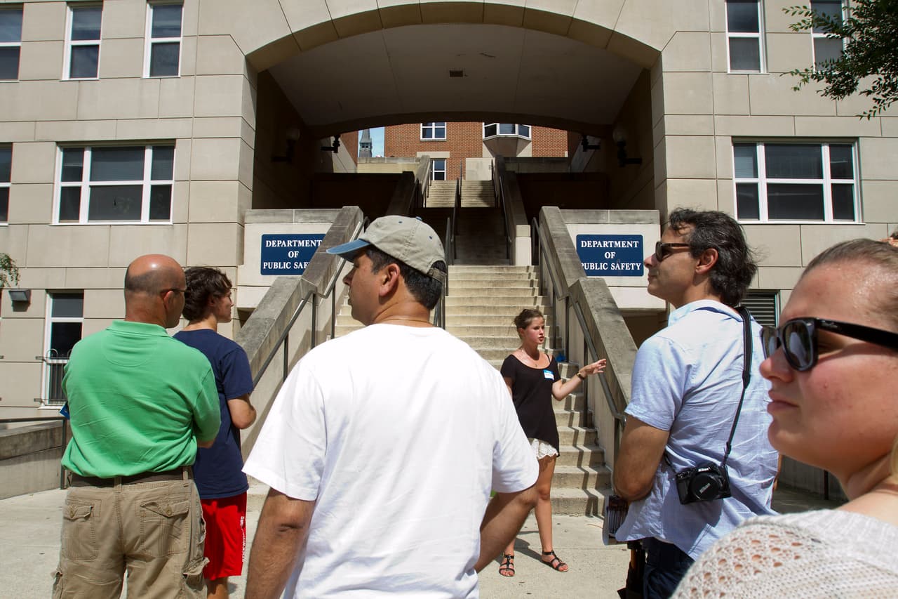 Prospective students and their parents tour Georgetown University's campus in Washington, on Wednesday, July 10, 2013. The defeat of a student loan bill in the Senate on Wednesday clears the way for fresh negotiations to restore lower rates, but lawmakers are racing the clock before millions of students return to campus next month to find borrowing terms twice as high as when school let out. (AP Photo/Jacquelyn Martin)