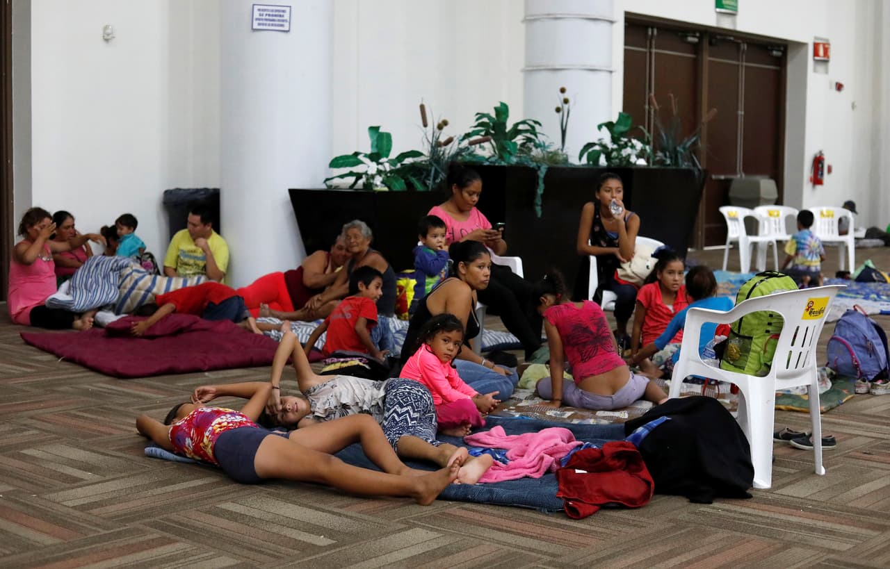 People who were evacuated from their homes are seen in a big room at the Convention Center being used as a shelter while Hurricane Willa approaches the Pacific beach resort, Mexico October 23, 2018. REUTERS/Henry Romero