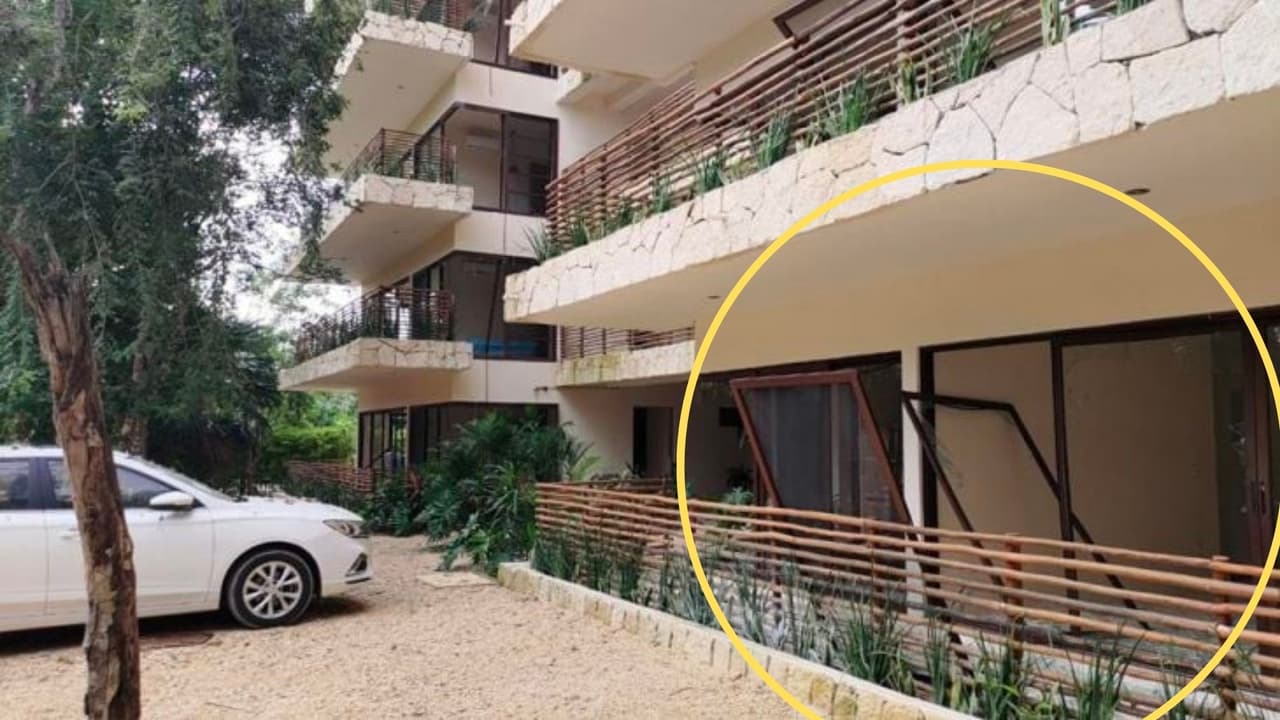 Ventanas destrozadas por la explosión en un complejo de apartamentos en Tulum, México.