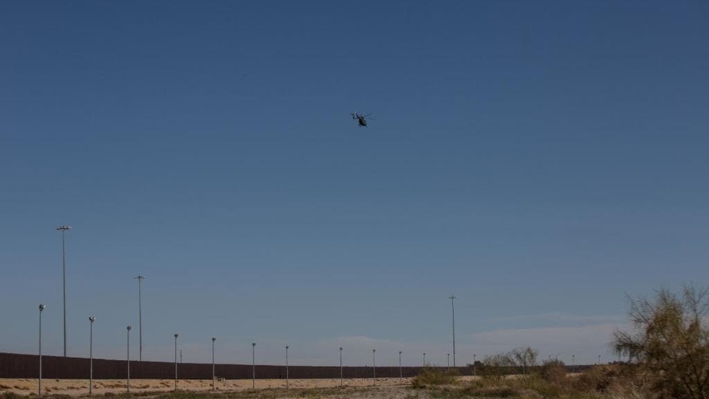 A Border Patrol helicopter monitors the border in the El Paso sector.