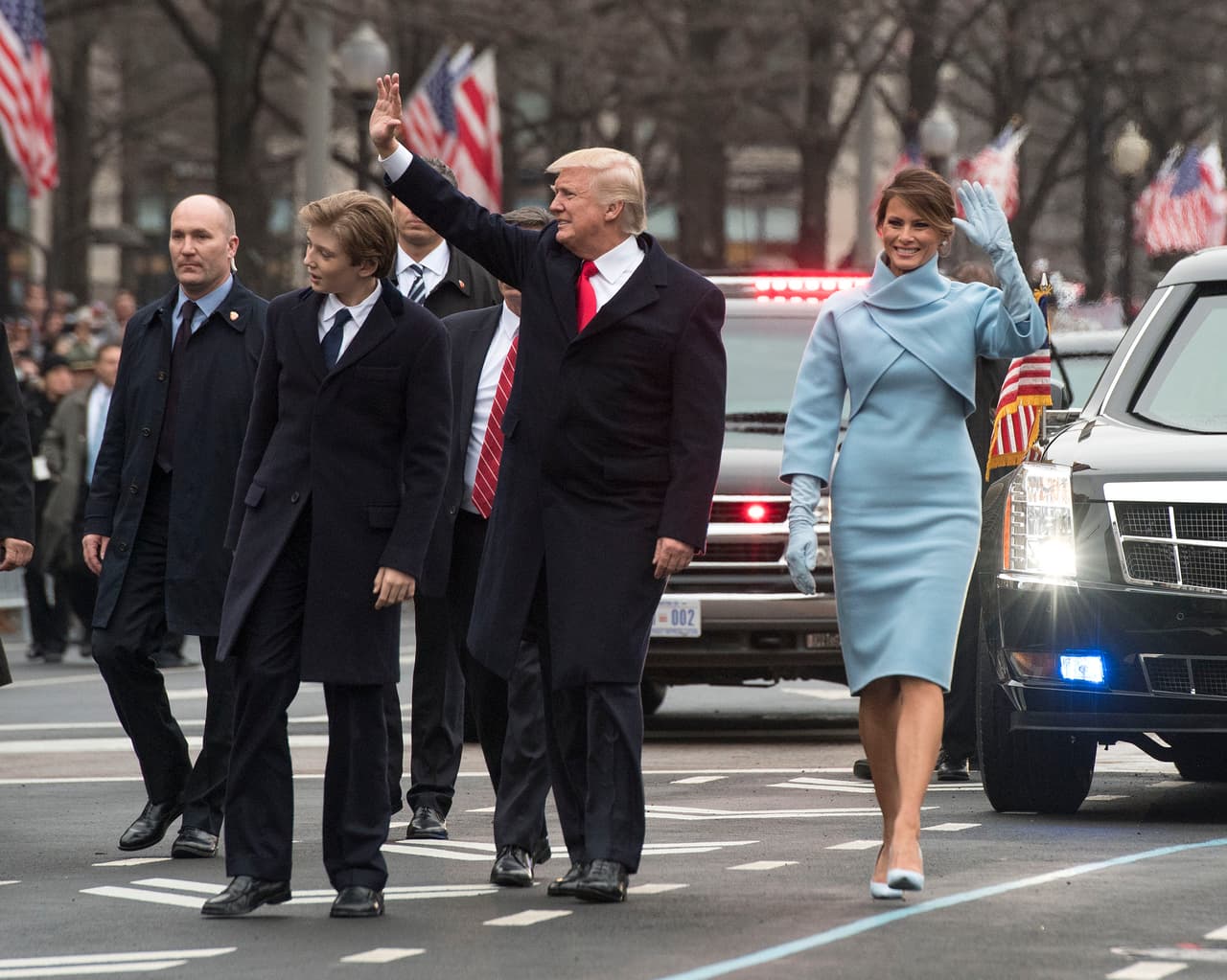 WASHINGTON, DC - JANUARY 20: President Donald Trump and first lady Melania Trump, along with their son Barron, walk in their inaugural parade on January 20, 2017 in Washington, DC. Donald Trump was sworn-in as the 45th President of the United States. (Photo by Kevin Dietsch - Pool/Getty Images)