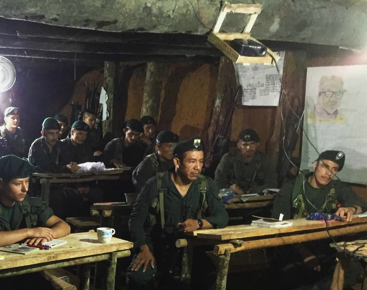 FARC fighters receive a course in an underground classroom at a rebel camp in southern Colombia. It is part of an initiative to give the fighters the tools to reinsert into society following the peace accord.