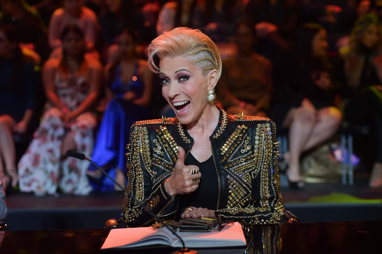 Había llegado la hora de presentar al jurado: Yuri estaba lista para evaluar.