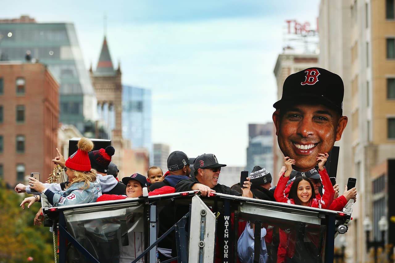 BOSTON, MA - OCTOBER 31: Camila Cora, daughter of Boston Red Sox manager Alex Cora, holds a cutout of his face during the 2018 World Series victory parade on October 31, 2018 in Boston, Massachusetts. (Photo by Adam Glanzman/Getty Images)