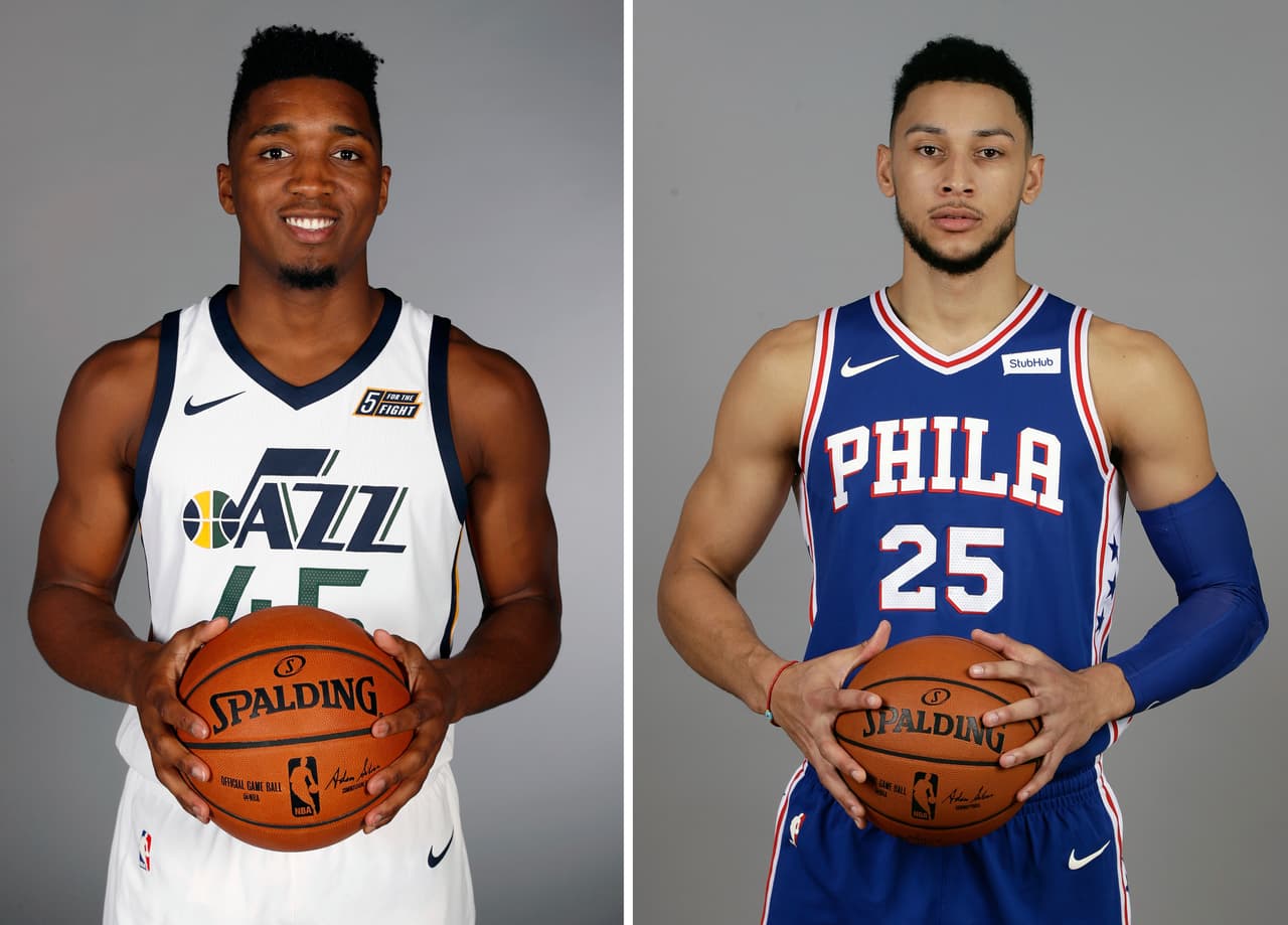 FILE - At left, in a Sept. 25, 2017, file photo, Utah Jazz's Donovan Mitchell, poses for a picture at their media day in Salt Lake City. At right, also in a Sept. 25, 2017, file photo, Philadelphia 76ers' Ben Simmons poses for a photograph at their media day in Camden, N.J. Simmons and Mitchell are unanimous selections to the NBA's All-Rookie team, Tuesday, May 22, 2018. The two guards received all 100 first-place votes from a panel of sports writers and broadcasters.(AP Photo/File)