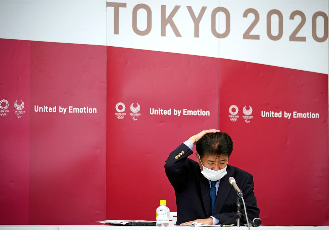 Tokyo 2020 Games Delivery Officer Hidemasa Nakamura gestures during a press conference after a roundtable on COVID-19 countermeasures at the Tokyo 2020 Olympic Games in Tokyo on May 28, 2021. (Photo by Franck ROBICHON / POOL / AFP) (Photo by FRANCK ROBICHON/POOL/AFP via Getty Images)