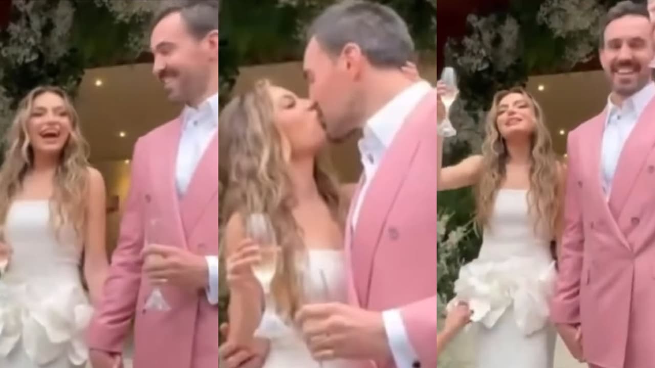 Sofía Castro y Pablo Bernot se dieron un romántico beso ante la prensa tras su boda.