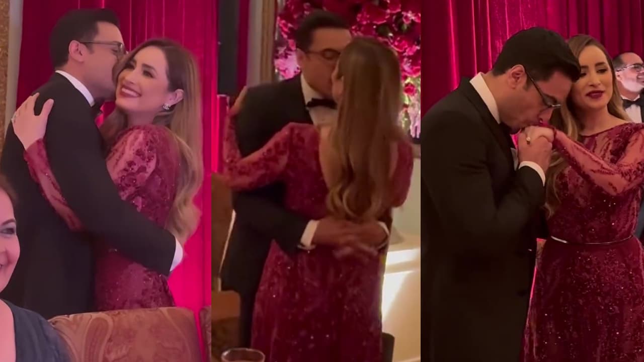 Carlos Rivera y Cynthia Rodríguez se besan en plena fiesta
