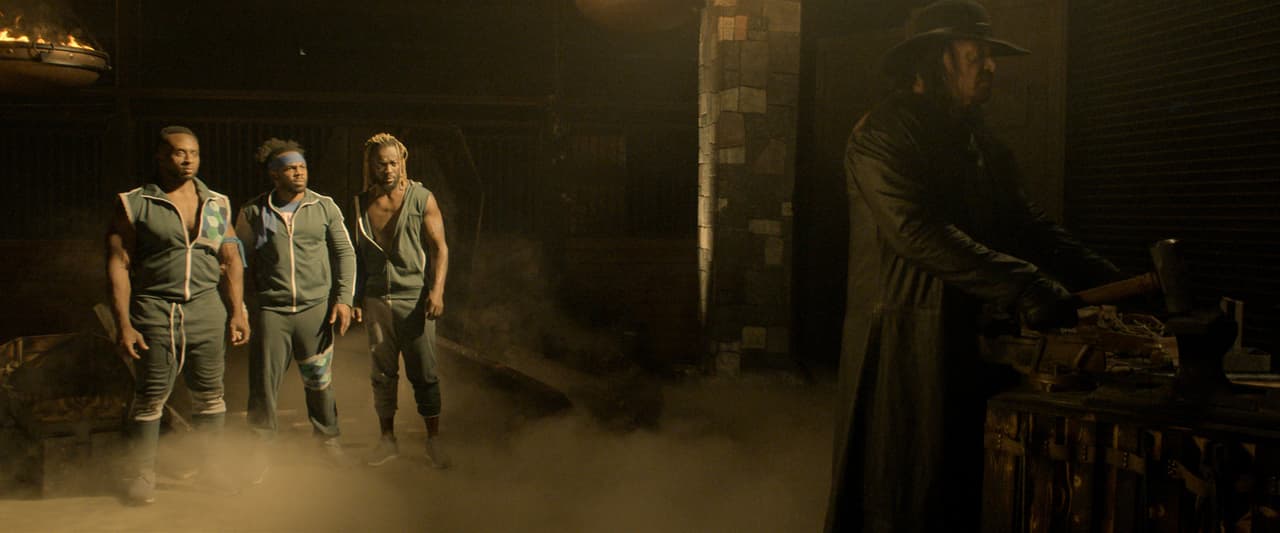 Big E, Xavier Woods, Kofi Kingston y The Undertaker.