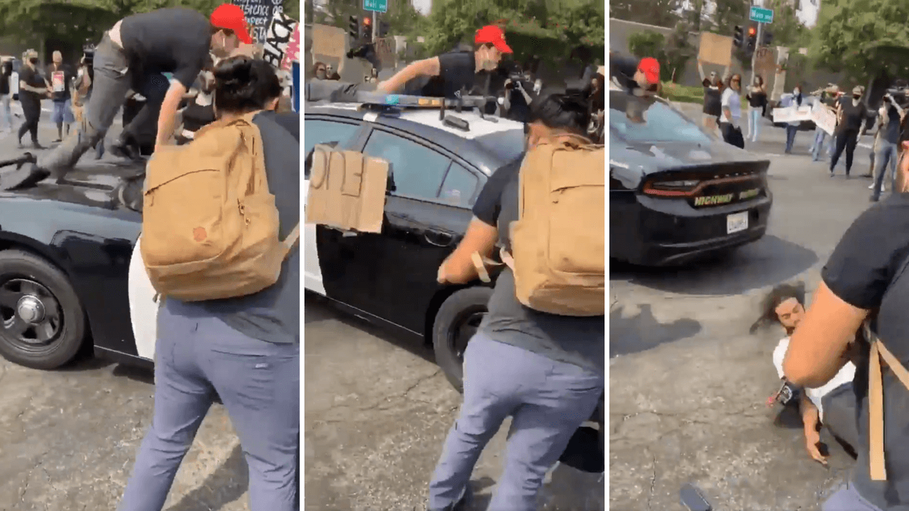 Un manifestante anti Trump sale volando después de subirse a una patrulla