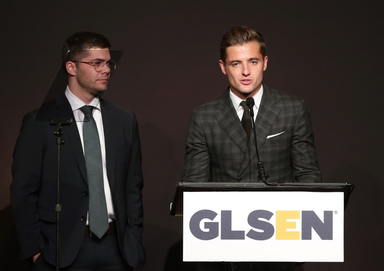 Andrew Graham y el jugador de soccer Robbie Rogers.