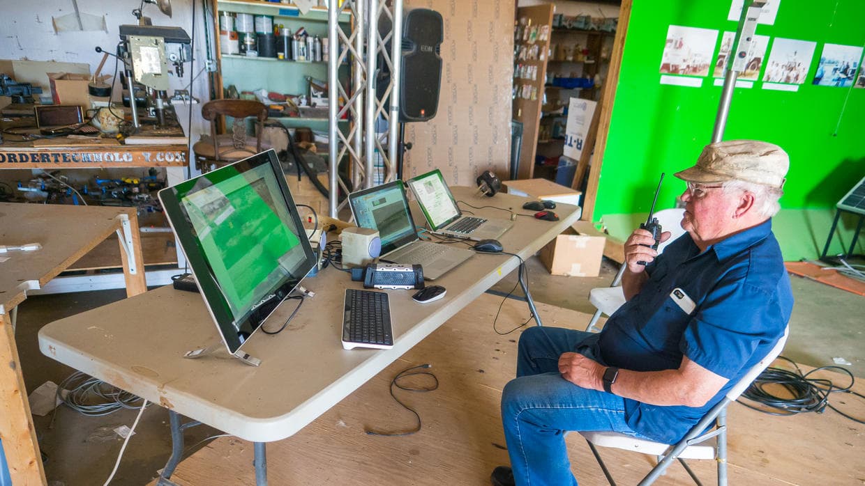 Glenn Spencer directs a demonstration of SEIDARM, the system of sensors he patented.