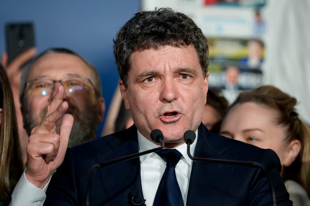 Presidential candidate Nicusor Dan speaks after polls closed for the second round of the country's presidential election redo in Bucharest, Romania, Sunday, May 18, 2025. (AP Photo/Andreea Alexandru)