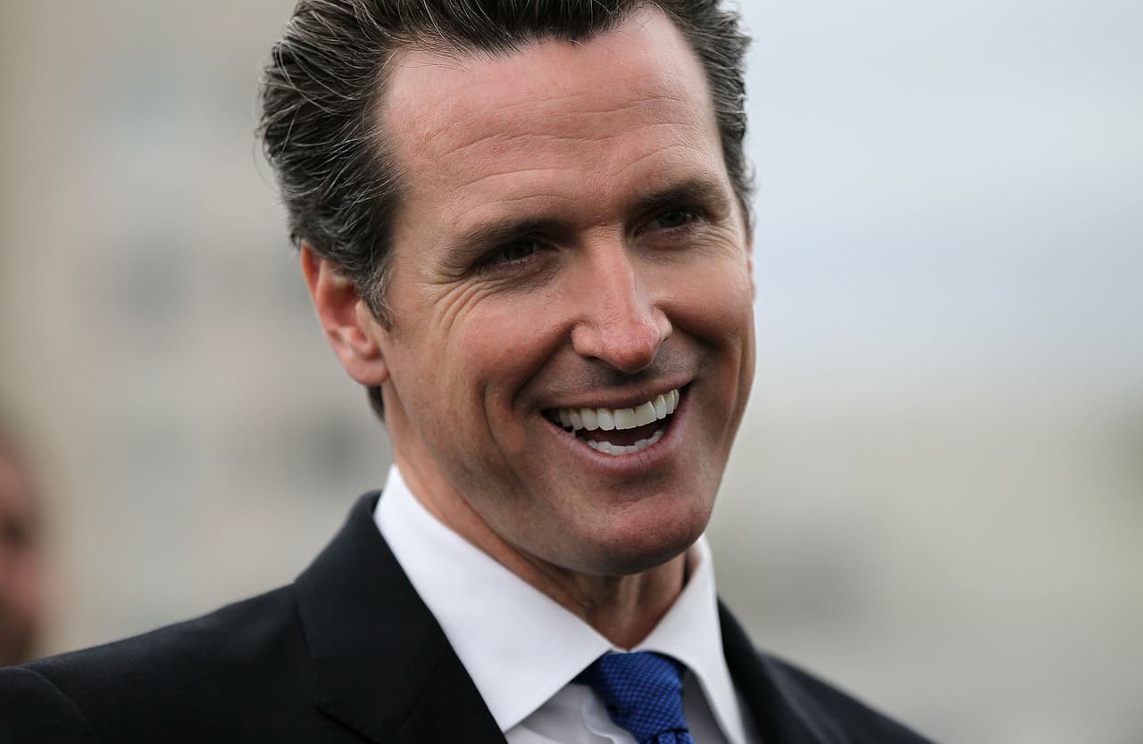 SAN FRANCISCO - MAY 25: San Francisco mayor Gavin Newsom smiles during a news conference May 25, 2010 in San Francisco, California. Mayor Newsom signed fee deferment legislation that will stimulate development and and generate construction jobs by allowing developers to defer upfront city development impact fees. (Photo by Justin Sullivan/Getty Images)