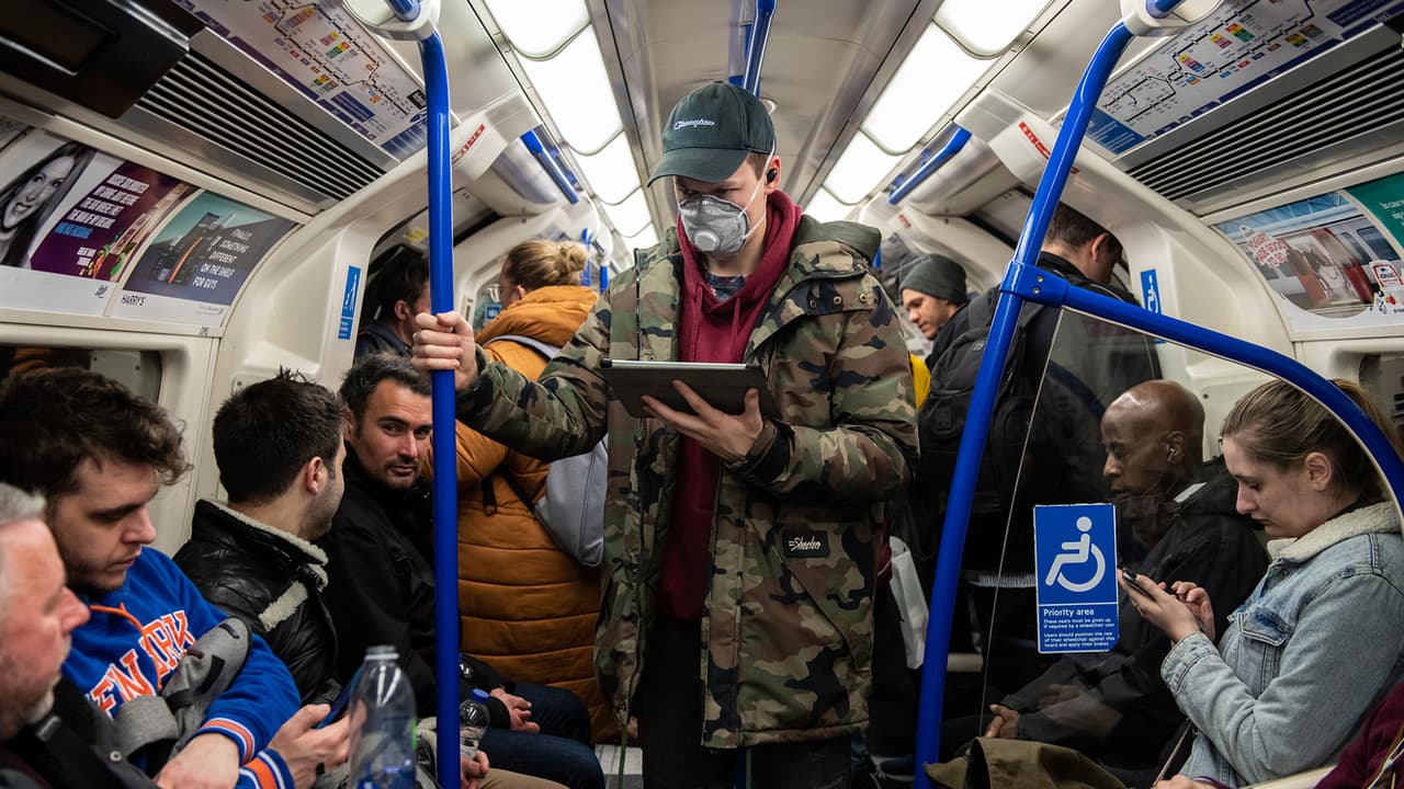 Commuters continue to pack onto the London Underground (metro) despite fears of coronavirus.