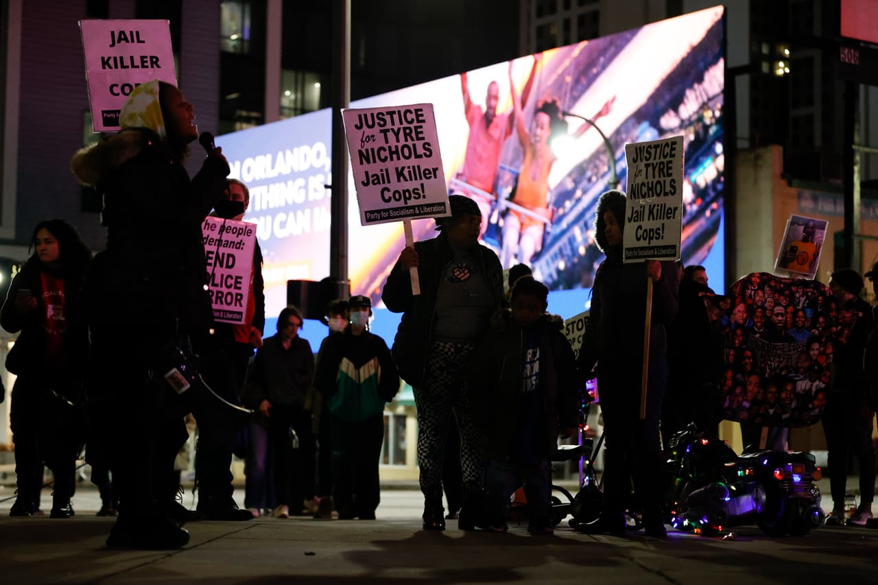 Demonstrators gather during a protest over the death of Tyre Nichols, Friday, Jan. 27, 2023, in Atlanta. (AP Photo/Alex Slitz)