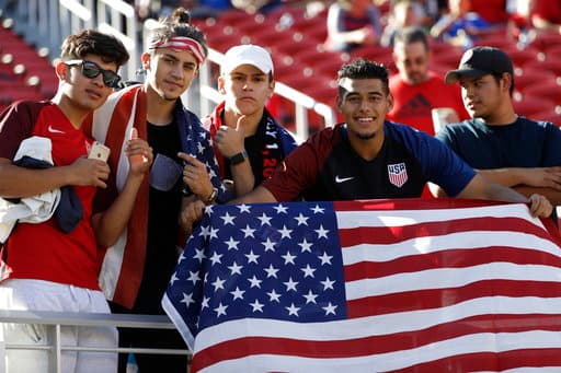 United States fans pose for photos before the Gold Cup final soccer match between the United States and Jamaica in Santa Clara, Calif., Wednesday, July 26, 2017. (AP Photo/Marcio Jose Sanchez)