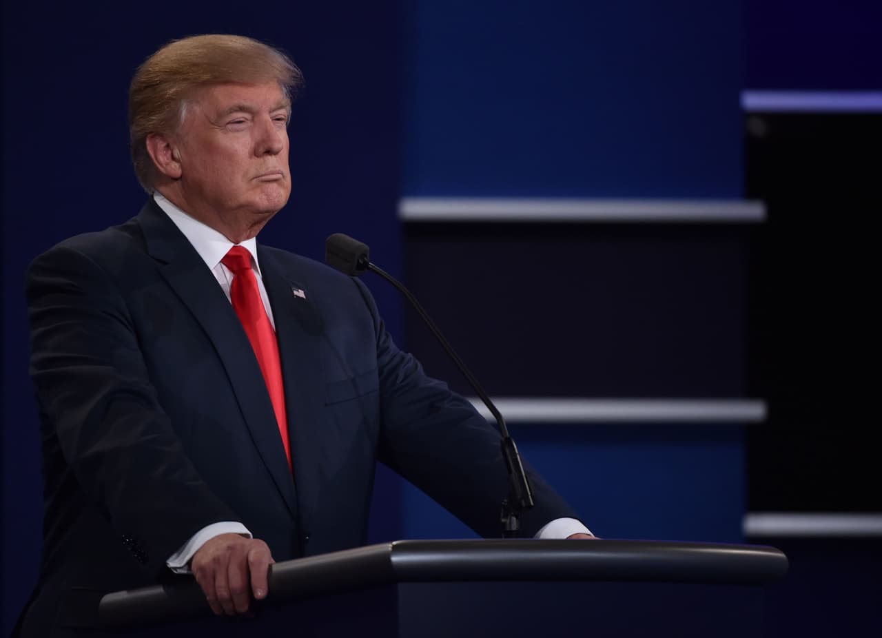 Republican presidential nominee Donald Trump stands at his podium at the start of the third and final US presidential debate with Democratic nominee Hillary Clinton at the Thomas & Mack Center on the campus of the University of Las Vegas in Las Vegas, Nevada on October 19, 2016. / AFP / Paul J. Richards (Photo credit should read PAUL J. RICHARDS/AFP/Getty Images)
