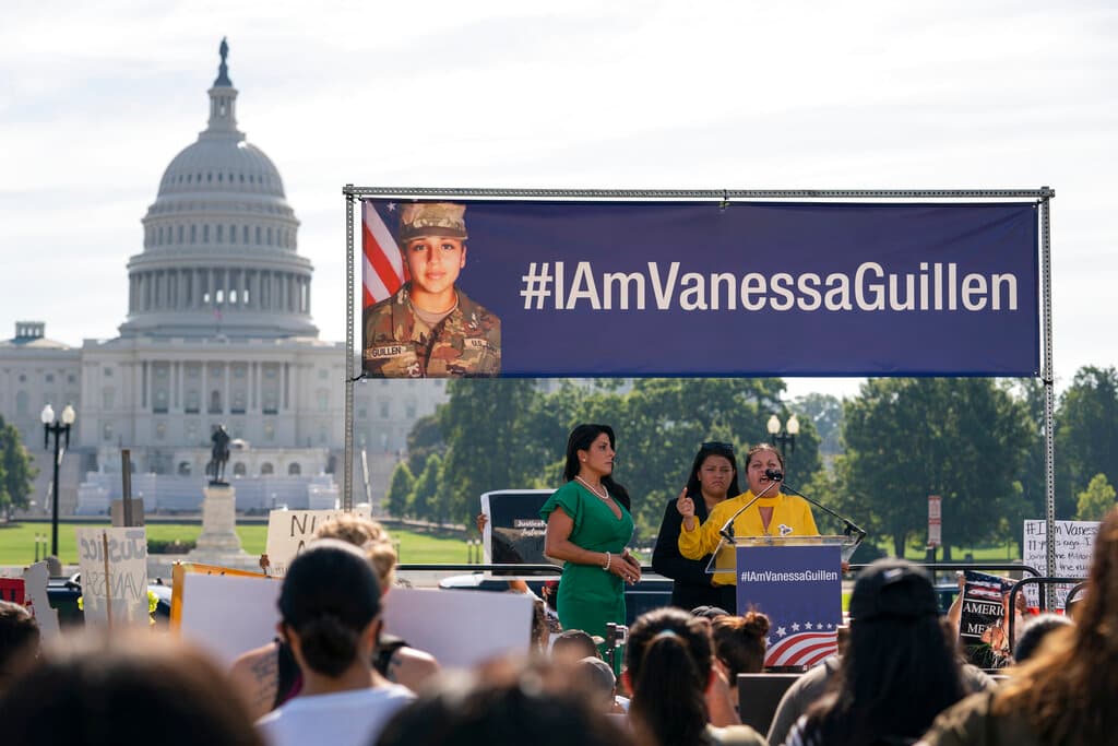 In this July 30, 2020, file photo slain Army Spc. Vanessa Guillen's mother Gloria Guillen, right, joined by Vanessa's sister Lupe Guillen, center, and family attorney Natalie Khawam, speaks as she cries during a news conference on the National Mall in front of Capitol Hill in Washington.