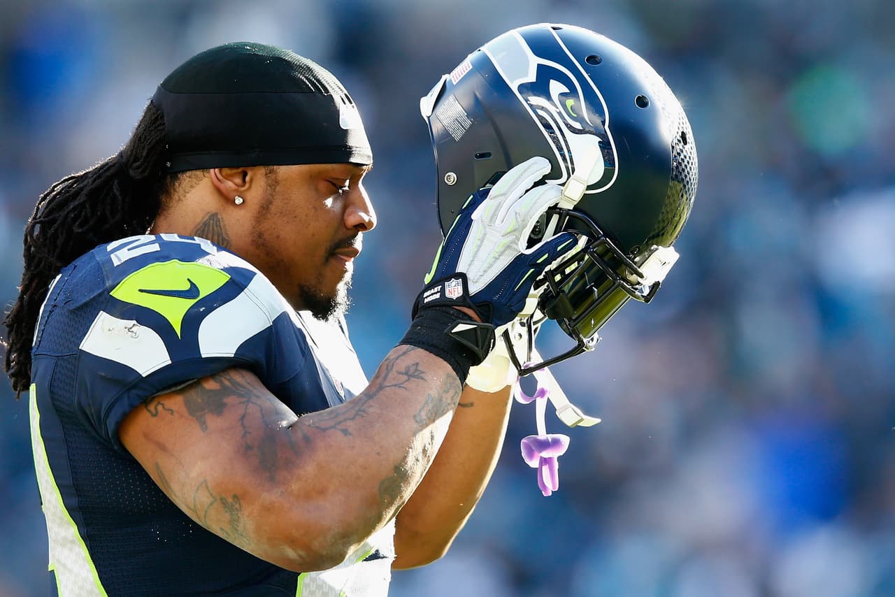 CHARLOTTE, NC - JANUARY 17: Marshawn Lynch #24 of the Seattle Seahawks looks on during the third quarter of the NFC Divisional Playoff Game against the Carolina Panthers at Bank of America Stadium on January 17, 2016 in Charlotte, North Carolina. (Photo by Jamie Squire/Getty Images)