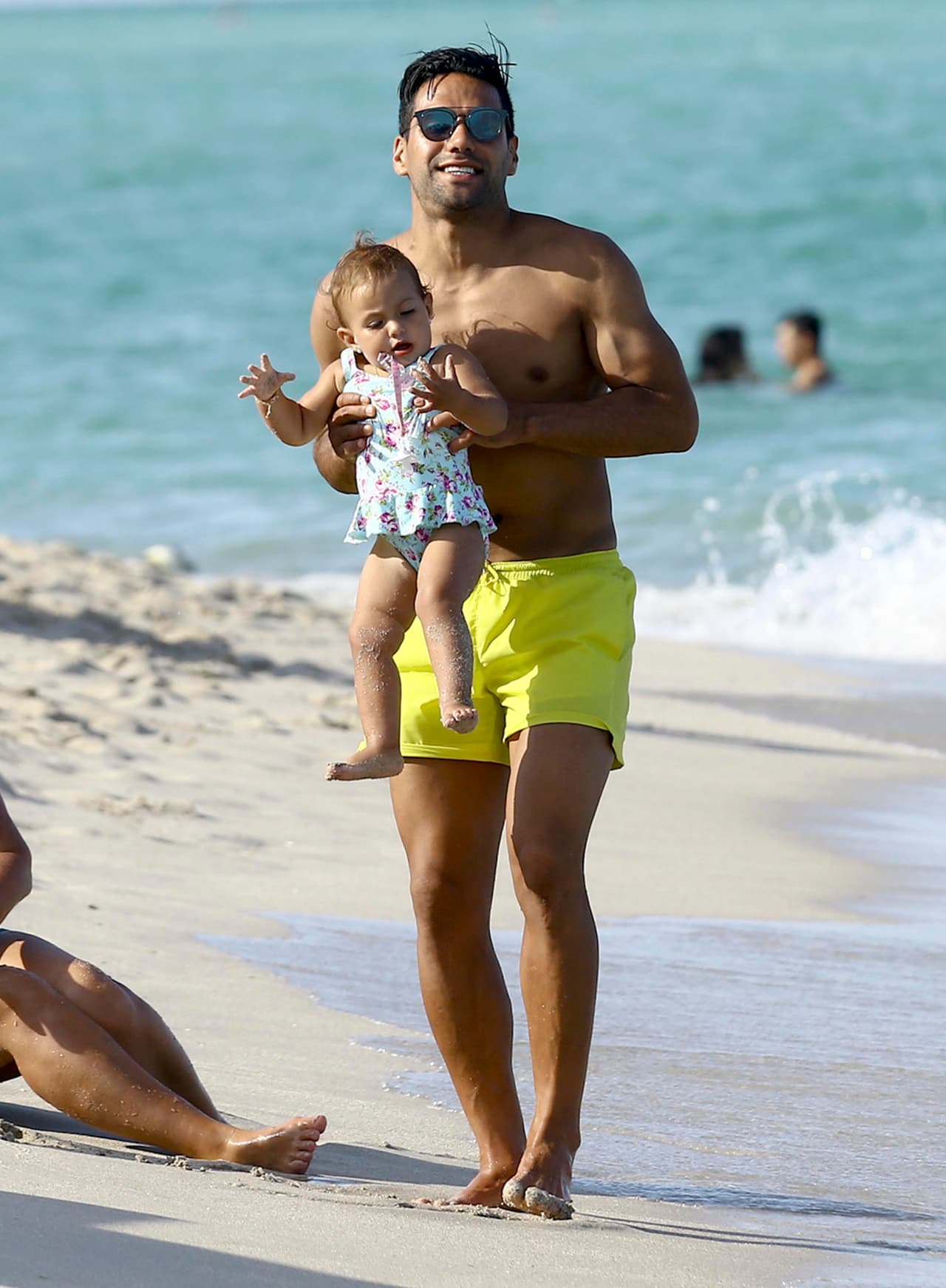 Sus dos hijas, Dominique y Desiree, y su esposa Lorelei Taron.