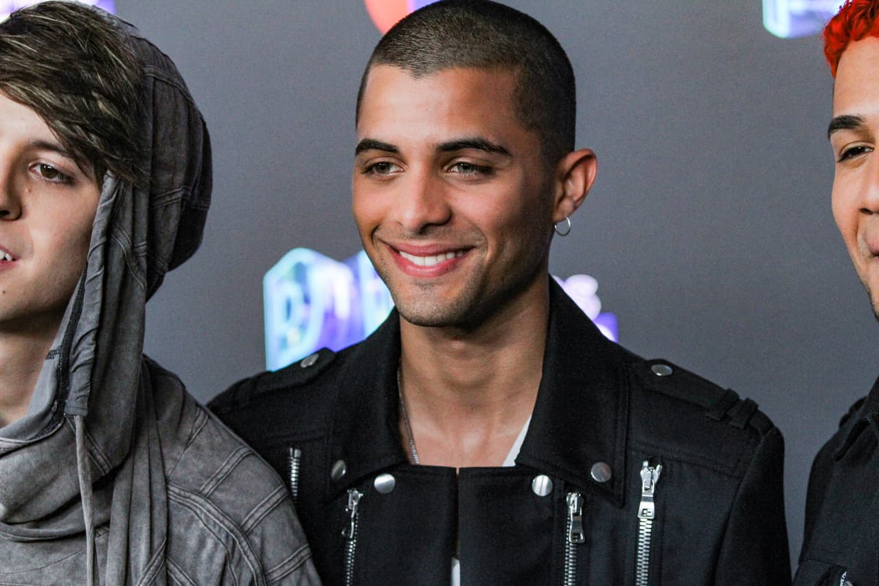 El cubano Erick Brian Colón con la cabeza completamente rapada y usando una chamarra negra con zippers por todos lados.