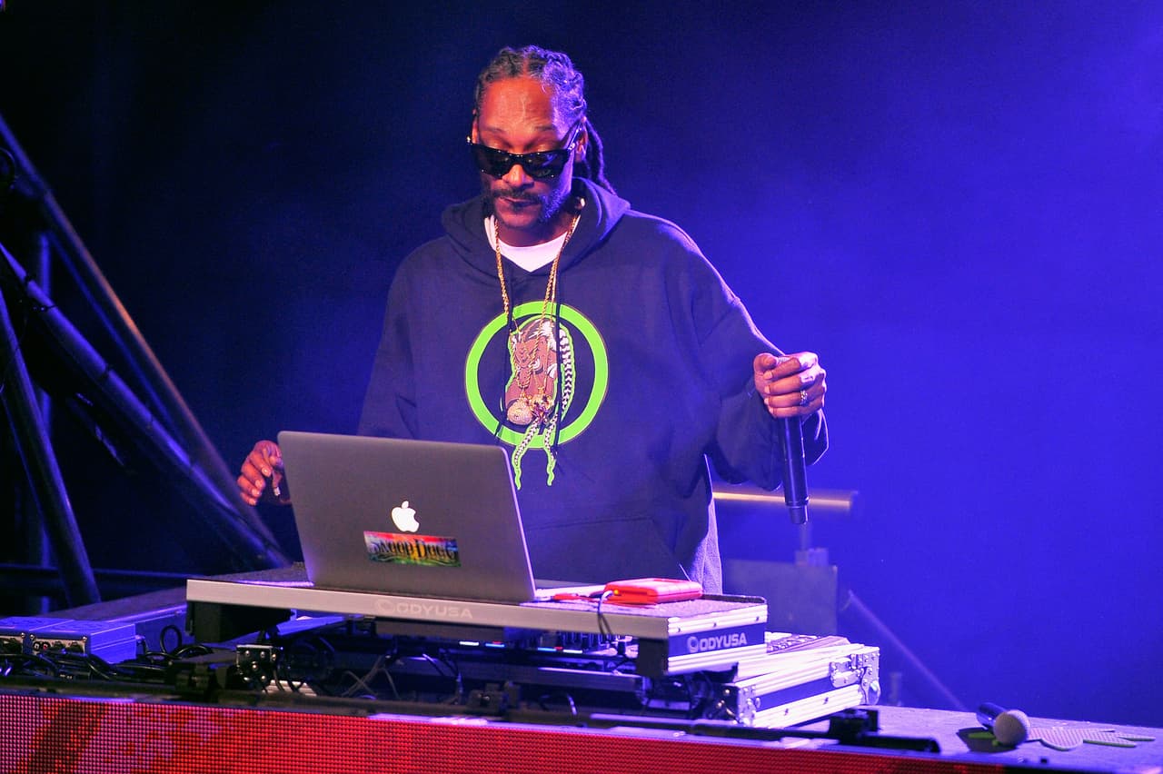 SAN FRANCISCO, CA - FEBRUARY 06: DJ Snoopadelic AKA Snoop Dogg spins onstage during DirecTV Super Saturday Night co-hosted by Mark Cuban's AXS TV at Pier 70 on February 6, 2016 in San Francisco, California. (Photo by Steve Jennings/Getty Images for DirecTV)