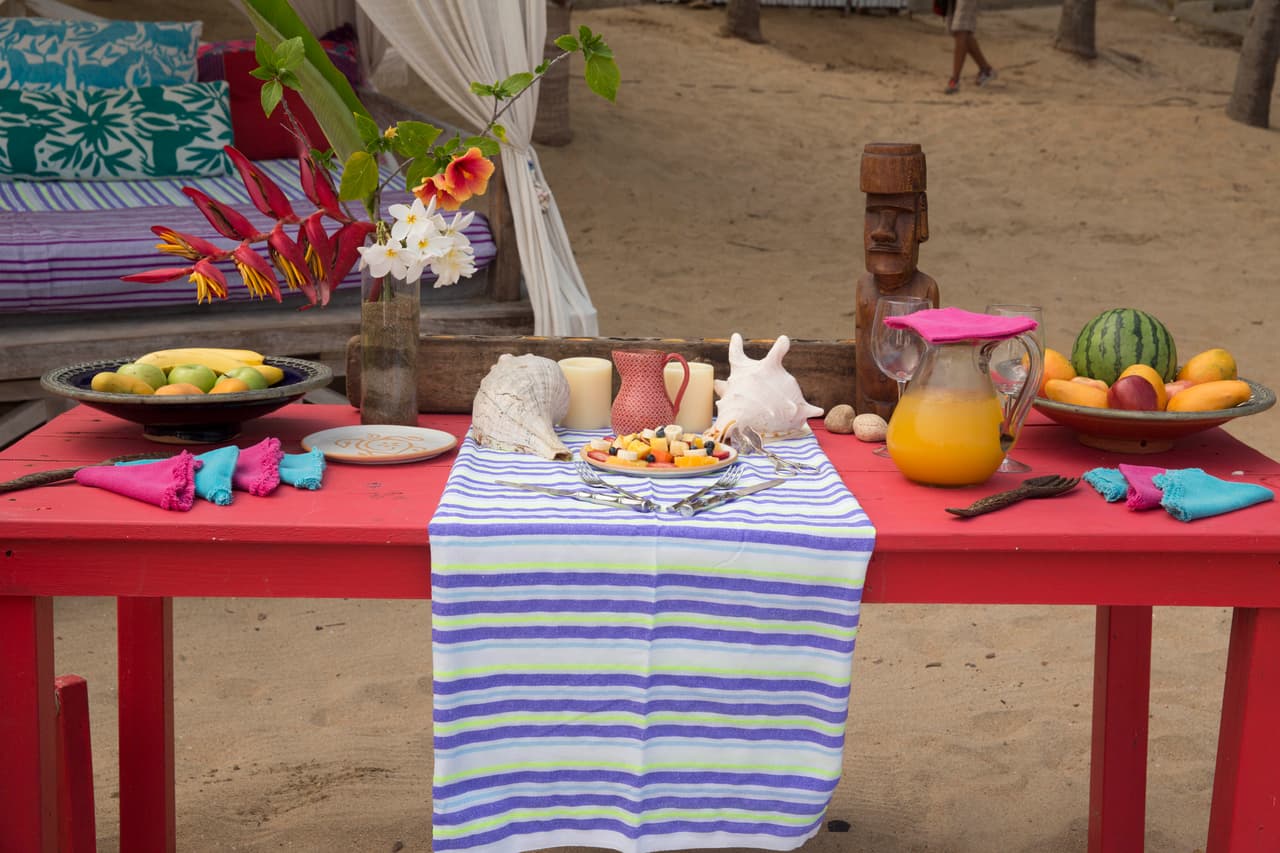 ¡Qué buen picnic playero! Todo se ve perfecto.
