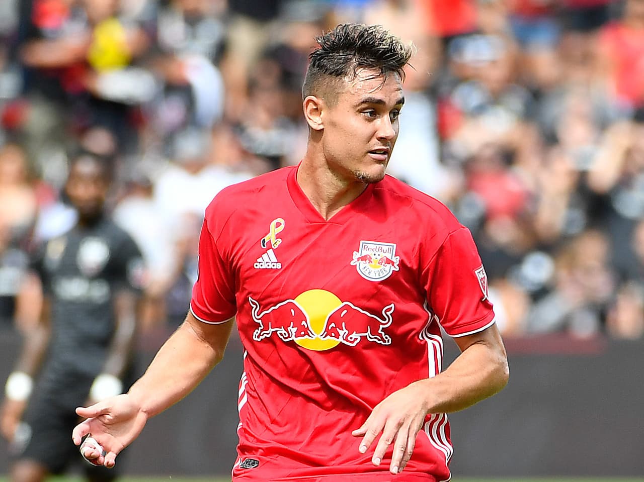 Sep 16, 2018; Washington, DC, USA; New York Red Bulls midfielder Aaron Long (33) passes the ball against the D.C. United during the second half at Audi Field. Mandatory Credit: Brad Mills-USA TODAY Sports