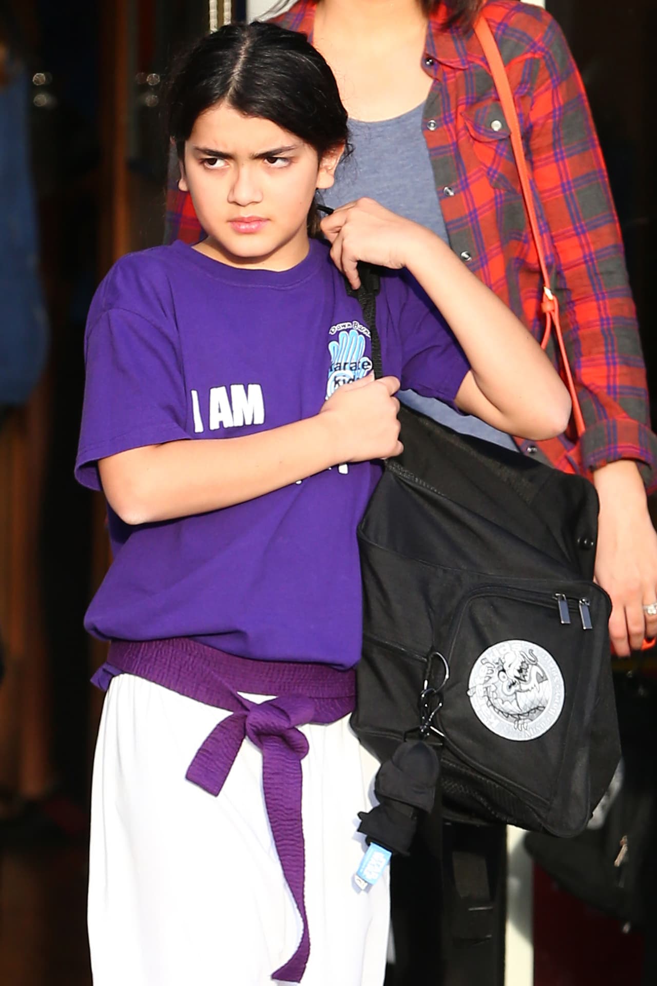 Dos años después, en 2012, con 10 años de edad. En esta fotografía se le vio por primera vez con cinturón púrpura de artes marciales.