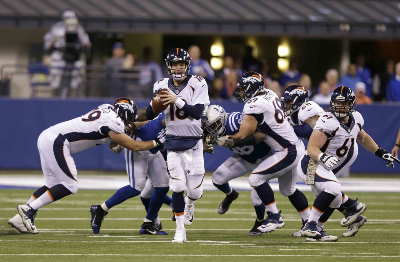 Los Indianapolis Colts vencieron 27 - 24 a los Denver Broncos para quitarles el invicto, Peyton Manning no pudo romper el récord de yardas por pase.