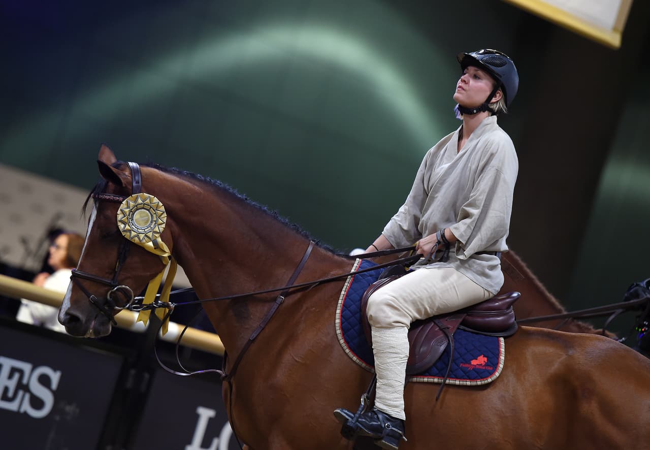 La amante de los perros y los animales en general quiso participar con su equipo.